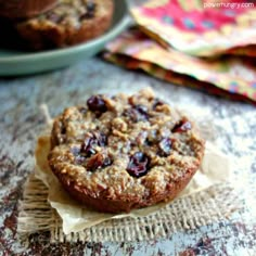 an oatmeal cookie sitting on top of a piece of paper