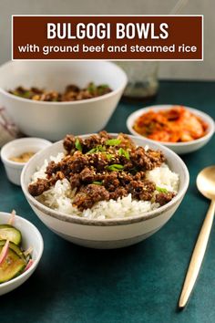 bowls filled with rice, meat and vegetables on a table