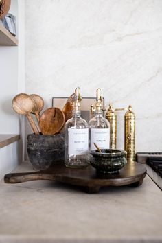 the kitchen counter is clean and ready to be used as a spice rack for cooking