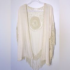 *This Nwt Macrame Open Vest Is In Perfect Condition! Measurements Are Approximate. Beautiful Cream Color And Fringe Details Are On Trend For This Years Fall Fashion! *Definite Boho, Hippie, Festival Vibes With This Piece. Easy To Layer With Other Pieces. *Message Me With Questions Or More Pics Add A Touch Of Bohemian Style To Your Outfit With This Beautiful Everleigh Macrame Vest In A Soft Cream Color. The Shawl Features A Solid Pattern And Is Made Of Polyester Knit Fabric, Measuring Approximate Macrame Jacket, Macrame Vest, Small Fringe, Boho Vest, Clothing Diy, Macrame Boho, Hippie Festival, Festival Vibes, Vest Fashion