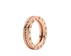 B.zero1 one-band ring in 18 kt rose gold set with pavé diamonds on the spiral. $5,100.00 Rings Bvlgari, Bvlgari Ring, Platinum Wedding Rings, Twisted Band, Italian Jewelry, Ring Size Guide, Gold Set, Unique Engagement Rings, Number 1