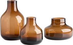 three brown vases sitting next to each other