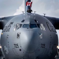 an air force plane with the canadian flag on it's nose