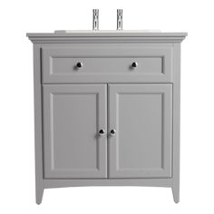 a white cabinet with two doors and drawers on the bottom, in front of a white background