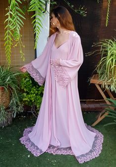 "A gorgeous outfit in dusty pink chiffon. With wide sleeves and flared cut for robe and nightgown. Comfortable lines that adapt to any silhouette. The adjustable neckline and the straps are in satin. It has an unbeatable touch, so soft and silky to the touch. You can't do without it! This is the ideal gift for a magical night of love. IMPORTANT INFORMATION: Our delivery time is approximately 10 business days depending on the model. We ship via DHL and have full coverage insurance. Once your orde Aliexpress Dresses, Fancy Robes, Wedding Nightgown, Bridal Lingerie Set, Nightgown Set, Pink Nightgown, Night Set, Nightgown Sets, Satin Fashion