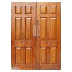 an old wooden double door on a white background