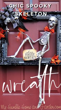 a skeleton is standing in front of a red door with the words wreath written on it