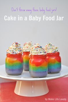 rainbow cakes in baby food jars on a plate