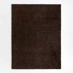 a brown area rug on a white background with space for text or image to be added