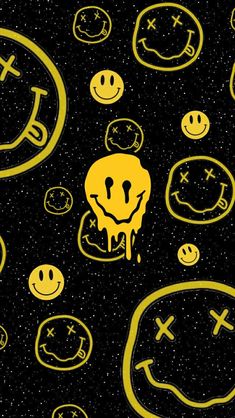 a bunch of smiley faces on a black background