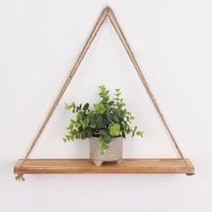 PRICES MAY VARY. RUTLEDGE & KING HANGING SHELVES - The simplistic design of the Rutledge & King hanging wall shelves infuse minimalist and modern styling to create the perfect accent for any room. Create an eye catching display to compliment your unique space with the Rutledge & King hanging plant shelf! STURDY WOODEN FRAME - These beautiful hanging storage shelves have a sturdy wood base that looks great on bedroom walls and hallways. Traditional wall shelves can look uninteresting and dry, the Hanging Wall Shelves, Hanging Plant Shelf, Hanging Wood Shelves, Hanging Storage Shelves, Hanging Rope Shelves, Rope Shelf, Minimalist Shelves, Traditional Toilets, Wooden Wall Shelves