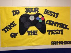 a video game controller on a bulletin board that says do your best control of the test