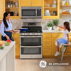 a woman and child are in the kitchen cooking food on stoves, while an adult watches