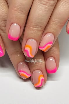 Embrace the sprightly charm of summer with these almond-shaped nails featuring a playful wave design. A sheer nude base sets the stage for vibrant pink and orange strokes that ripple across each nail, creating a fresh and dynamic look perfect for warm-weather adventures. Vibrant and joyous, these nails are a lively expression of seasonal bliss. 🌊🧡💖  // Photo Credit: Instagram @nailsbybrooke___ Preppy Pink And Orange Nails, Hot Pink And Orange Nail Designs, Gel Nails For Mexico Vacation, Hot Pink And Neon Orange Nails, Pink And Orange Swirl Nails, Pink Wave Nails, Nude Base Nail Designs, Bright Nails Designs