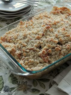 a casserole dish filled with food on top of a table