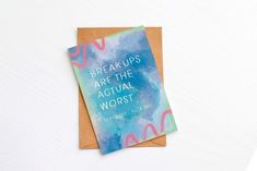 two greeting cards with the words break ups are the actual worst on them next to an envelope