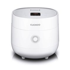 the cuckoo ultra humider is white and has an alarm clock on it