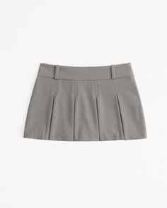 Our new mid rise mini skort in our everyday menswear fabric, featuring a shorts lining underneath for comfort, stitched-down pleating details, belt loops and functional side zipper for a secure fit. Debate Outfits, Fall Wishlist, Female Features, Pleaded Skirt, Clothes Wishlist, Grey Mini Skirt, College Fits, Women's Bottoms, Going Out Outfits