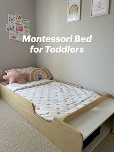 a child's bed with the words montessori bed for toddlers above it