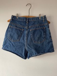 Vintage 80s high waisted denim shorts by Newport News. Tag size 8.  Waist = 13 Hips= 17.5 Length = 14 Cheap Vintage Blue Jean Shorts, Affordable Vintage Mid-rise Jean Shorts, Retro High Waist Denim Shorts, Retro High-waist Denim Shorts, Retro Medium Wash Jean Shorts, Retro High Rise Denim Shorts, Retro High Waist Medium Wash Shorts, Retro High Waist Jean Shorts With Built-in Shorts, Retro High-waisted Jean Shorts With Built-in Shorts