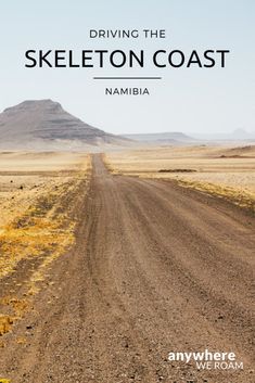 a dirt road with the words driving the skeleton coast in namibia on it's side