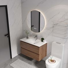 a bathroom with a toilet, sink, and mirror in it's center area