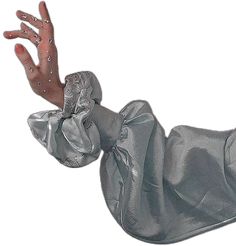 a person with their hand out in the air, wearing a silver dress and gloves