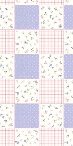 a pink and blue checkered fabric with flowers on it