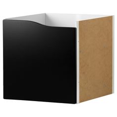 a black and white wall mounted cabinet with a brown cardboard cover on the bottom half