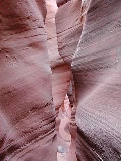 a narrow slot in the side of a canyon