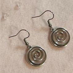 Swirl Spiraling Earring Silver Brand New For Girls Women Boy Men Men’s Women’s Unisex Silver Tone Spiral Earrings. *Brand New. *Silver Tone. *Earrings Size: 3cm/1.5 Inches Approximately. *Material: Stainless Steel And Aluminum Alloy. *Occasion: Casual, Formal, Going Out, Work, School, Gifting, Etc. *Style: Goth Grunge Aesthetic Vintage Y2k 2000s Emo Punk 90’s. Will Ship Next Day Or Same Day If Possible. Tags: #Y2k #Vintage #Earrings #Coquette #Swirl Pendant Balletcore Indie Grunge Streetwear Pre Goth Girl Jewelry, Goth Silver Jewelry, Old Silver Jewellery, Punk Jewelry Aesthetic, 90s Grunge Accessories, Acubi Earrings, Y2k Grunge Jewelry, Downtown Girl Jewelry, Earrings 2000s