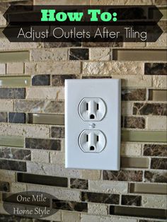 an electrical outlet is shown with the words how to adjust outlets after tiling on it