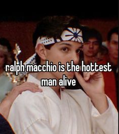 a woman with her hand on her face and the words rapp machchio is the hottest man alive