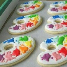 there are many decorated cookies in the box