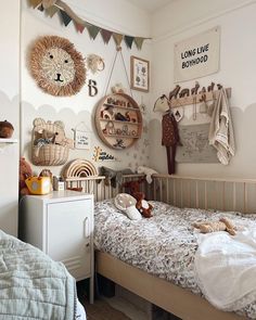 a child's bedroom with two teddy bears on the bed