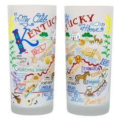 two shot glasses with kentucky state maps painted on each one and the words kentucky written in different languages