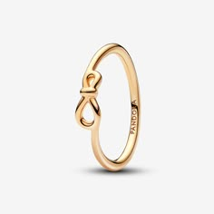 Our Infinity Knot Ring is the perfect representation of an unbreakable bond and a stylish addition to your collection. Pandora's unique interpretation of the infinity symbol, the knot wraps around an asymmetrically set center to signify the strength of the connection. When forever isn't enough, try wearing this 14k gold-plated ring with other infinity-inspired pieces to amplify the message and create a statement jewelry look. - Pandora Infinity Knot Ring - 14k Gold-plated unique metal blend - Sz Silver Wedding Gifts, Infinity Knot Ring, Palladium Metal, Pandora Gold, Infinity Knot, Bracelet Pandora, Gold Armband, Diy Charm Bracelet, Pandora Rings