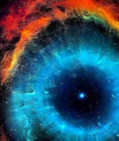 an eyeball is shown in the middle of space