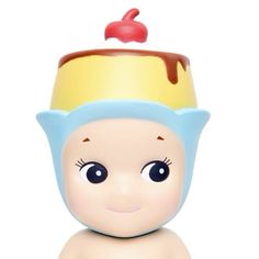 a small toy doll with a hat on top of it's head and eyes