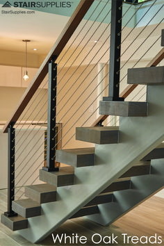 an image of a stair case with white oak treads