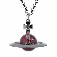 PRICES MAY VARY. UNIQUE DESIGN: Discover the allure of the cosmos with our Black and Red Saturn Necklace for Women. This eye-catching piece features a punk cross and a stunning red Saturn pendant, making it a must-have accessory for those who appreciate unique jewelry. DIMENSIONS: Pendant Size: 6 x 5 cm (2.36 x 2 inches), Chain Length: 80 cm (31.4 inches), Weight: 100 g (3.5 oz) HIGH-QUALITY MATERIALS: Crafted from premium alloy, this necklace boasts a deep red, crystal quartz Saturn pendant surrounded by a ring embellished with sparkling crystals. The dark gunmetal finish on the chain enhances the Gothic aesthetic, ensuring both durability and style. THE PERFECT GIFT: An unforgettable gift for any occasion—be it a birthday, anniversary, Valentine’s Day, or Christmas. This Saturn necklace Steven Universe Jewelry, Red Aesthetic Fashion, Black And Red Jewelry, Red And Black Outfit, Cyberpunk Accessories, Saturn Pendant, Planet Pendant, Saturn Necklace, Saturn Planet