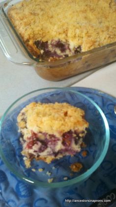 a blue plate topped with a dessert next to a casserole dish