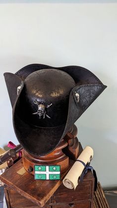 Black Dog leather look distressed Tricorne Pirate Hat.  Halloween,  Brixham, Hastings Pirate style. Great festival party and dressing up accessory. Grim n Dark this battle ready headgear will really add to your costume and look. Lightweight , durable, crushable, waterproof and original. Historical costume headwear, a Pirate special for festivals, parties, cosplay and historical events.  and having  fun times. Great value to add that touch of authenticity to your outfit. One size that fits most p Pirates Hat, Pirate Props, Pirate Style, Pirate Fashion, Pirate Hat, Pirate Hats, Top Hats, Style Party, Party Fun