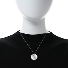 This is an authentic TIFFANY Sterling Silver Notes Round Pendant Necklace. The necklace is crafted of sterling silver and features a polished round pendant engraved with the Tiffany & Co. New York address. Tiffany Necklace, Round Pendant Necklace, Tiffany Jewelry, The Necklace, Round Pendant, Tiffany & Co., Sterling Silver Necklaces, Silver Necklaces, Pendant Necklace