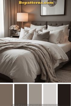 a bedroom with gray walls, white bedding and neutrals in the color scheme