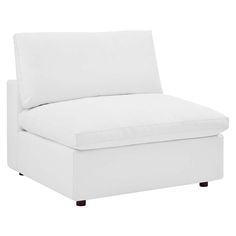 a white couch with pillows on it and a pillow in the back ground, against a white background