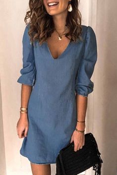 Material Imitation Denim Fabric Style Casual, Fashion Pattern Type Solid Neckline V Neck Silhouette Denim Dress Sleeve Length Half Sleeve Dresses Length Knee Length Size(in) Bust Waist Dresses Length Sleeve Length S 35.4 32.3 37 19.3 M 37.4 34.3 37.4 19.7 L 39.4 36.2 37.8 20.1 XL 41.3 38.2 38.2 20.5 2XL 43.3 40.2 38.6 20.9 3XL 45.3 42.1 39 21.3 Tips:Due to the many variations in monitors, the color in the image could look slightly different, please take physical design and color shall prevail.Pl Dress Sleeve Length, Half Sleeve Dresses, Solid Color Dress, Straight Dress, Minimal Chic, Color Dress, Vestido Casual, Mini Shirt Dress