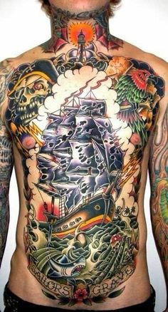 a man with tattoos on his back and chest is wearing an old school style ship tattoo