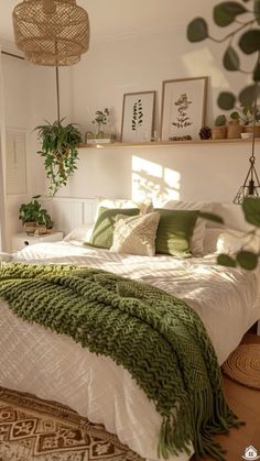 a bedroom with white walls and green accents