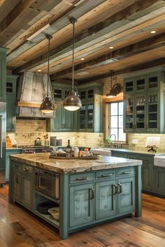 a large kitchen with wooden floors and green cabinets, an island in the middle is surrounded by hanging lights